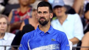 Serbia's Novak Djokovic looks on during his match against USA's Reilly Opelka at the Brisbane International. (Pat Hoelscher/AP)