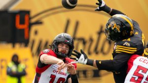 Ottawa Redblacks quarterback Dustin Crum (18) during CFL pre-season football game action against the Hamilton Tiger Cats in Hamilton, Ont. (Peter Power/CP)