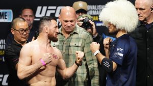 Merab Dvalishvili, left, and Umar Nurmagomedov face off at the UFC 311 ceremonial weigh-ins. (UFC Press)