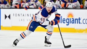 Edmonton Oilers defenceman Ty Emberson skates with the puck against the Vegas Golden Knights during the second period of an NHL hockey game, Tuesday, Dec. 3, 2024, in Las Vegas. (David Becker/AP)