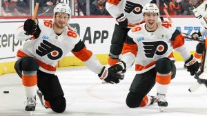 PHILADELPHIA, PENNSYLVANIA - MARCH 02: Joel Farabee #86 and Morgan Frost #48 of the Philadelphia Flyers skate during warm-ups prior to their game against the Ottawa Senators at the Wells Fargo Center on March 2, 2024 in Philadelphia, Pennsylvania. (Photo by Len Redkoles/NHLI via Getty Images)