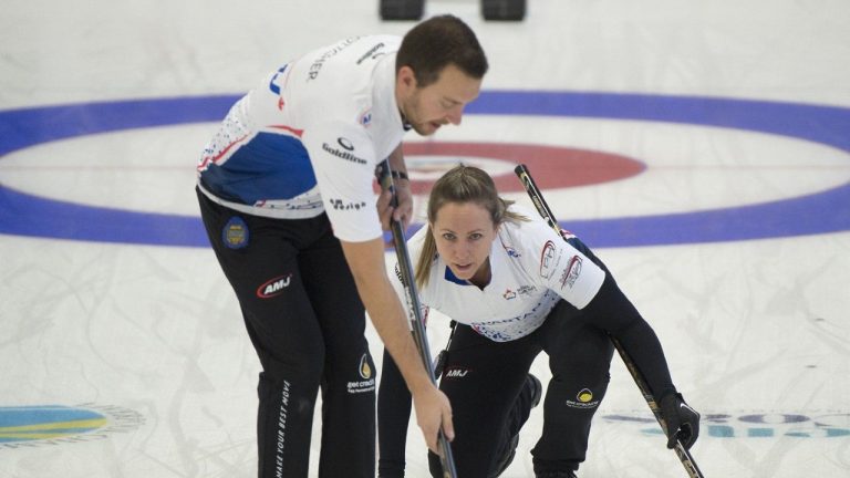 Rachel Homan and playing partner Brendan Bottcher compete against Jessica Zheng and Victor Pietrangelo during draw 5 action against at the Canadian mixed doubles curling trials. (Michael Burns/CP)