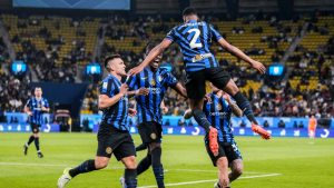 Inter Milan's Denzel Dumfries celebrates after scoring the opening goal during the Italian Super Cup semifinal soccer match between Inter Milan and Atlanta at Al Awwal Park stadium in Riyadh, Saudi Arabia, Thursday, Jan. 2, 2025. (Altaf Qadri/AP)