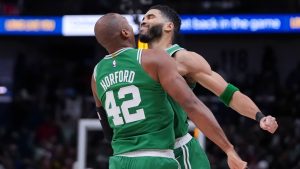 Boston Celtics forward Jayson Tatum celebrates with centre Al Horford (42) after his go-ahead, game-winning shot in the final second of the second half of an NBA basketball game in New Orleans, Friday, Jan. 31, 2025. (Gerald Herbert/AP)