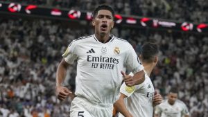 Real Madrid's Jude Bellingham celebrates after scoring his side's opening goal during the Spanish Super Cup semifinal soccer match between Real Madrid and Mallorca at the King Abdullah Stadium in Jeddah, Saudi Arabia, Thursday, Jan. 9, 2025. (Altaf Qadri/AP)