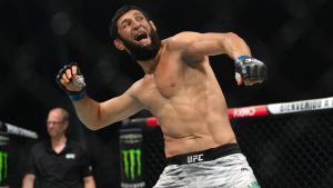 Khamzat Chimaev celebrates his win over Robert Whittaker in a middleweight mixed martial arts bout at UFC 308 in Abu Dhabi, United Arab Emirates. (Altaf Qadri/AP)