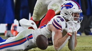 Buffalo Bills tight end Dalton Kincaid (86) drops the ball after hitting the ground on a fourth down play during the AFC Championship NFL football game against the Kansas City Chiefs Sunday, Jan. 26, 2025, in Kansas City, Mo. (Peter Aiken/AP)