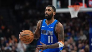 Dallas Mavericks guard Kyrie Irving dribbles during the second half of an NBA game against the Oklahoma City Thunder Friday, Jan. 17, 2025, in Dallas. (AP/LM Otero)