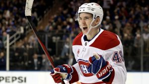 Montreal Canadiens defenseman Lane Hutson (48) reacts in the third period of an NHL hockey game against the New York Rangers Saturday, Nov. 30, 2024, in New York. The Rangers won 4-3. (AP Photo/Adam Hunger)