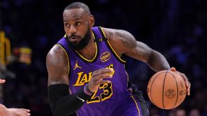 Los Angeles Lakers forward LeBron James drives toward the basket during the first half of an NBA basketball game against the Atlanta Hawks, Friday, Jan. 3, 2025, in Los Angeles. (Mark J. Terrill/AP)