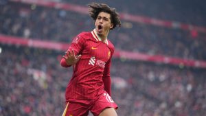 Liverpool's Jayden Danns celebrates after scoring his side's third goal during the FA Cup soccer match between Liverpool and Accrington Stanley at the Anfield stadium in Liverpool, England, Saturday, Jan. 11, 2025. (AP Photo/Jon Super)