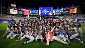 The Los Angeles Dodgers pose for a team picture after their win against the New York Yankees in Game 5 to win the baseball World Series, Thursday, Oct. 31, 2024, in New York. (Ashley Landis/AP)