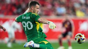 Toronto FC goalkeeper Luka Gavran kicks the ball during an MLS soccer match against the New York Red Bulls, Saturday, June 22, 2024, in Harrison, N.J. (AP Photo/Julia Nikhinson)