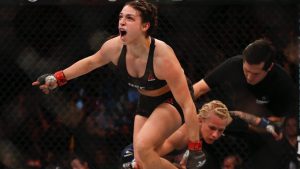 Mackenzie Dern celebrates after defeating Amanda Cooper at a UFC event in Rio de Janeiro, Brazil. (Leo Correa/AP)