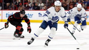 Toronto Maple Leafs' William Nylander (88) controls the puck after taking it from Carolina Hurricanes' Dmitry Orlov (7) during the first period of an NHL hockey game in Raleigh, N.C., Thursday, Jan. 9, 2025. (Karl DeBlaker/AP)