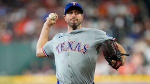 Texas Rangers starting pitcher Max Scherzer delivers against the Houston Astros during the first inning of a baseball game, Sunday, July 14, 2024, in Houston. (Eric Christian Smith/AP)