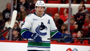 Vancouver Canucks' J.T. Miller (9) waits for a face-off against the Carolina Hurricanes during the third period of an NHL hockey game in Raleigh, N.C., Friday, Jan. 10, 2025. (Karl DeBlaker/AP)