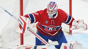 Montreal Canadiens goaltender Sam Montembeault makes a save against the Philadelphia Flyers during second period NHL hockey action in Montreal, Tuesday, April 9, 2024. (Graham Hughes/CP)