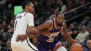 Phoenix Suns forward Kevin Durant (35) during the first half of an NBA basketball game against the Brooklyn Nets, Wednesday, Nov. 27, 2024, in Phoenix. (AP Photo/Rick Scuteri)