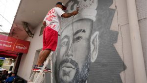 A mural of Brazilian soccer player Neymar is painted next to Vila Belmiro stadium in Santos, Brazil, Friday, Jan. 31, 2025, before a ceremony presenting him as a new Santos FC player. (Andre Penner/AP)