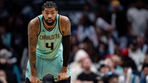 Charlotte Hornets center Nick Richards (4) looks on during the second half of an NBA basketball game against the Chicago Bulls in Charlotte, N.C., Monday, Dec. 30, 2024. (AP Photo/Jacob Kupferman)