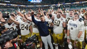 Notre Dame head coach Marcus Freeman an the team sing to fans after winning the Orange Bowl College Football Playoff semifinal game against Penn State, Thursday, Jan. 9, 2025, in Miami Gardens, Fla. (Rebecca Blackwell/AP)