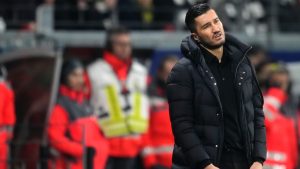 Dortmund's head coach Nuri Sahin grimaces during the German Bundesliga soccer match between Eintracht Frankfurt and Borussia Dortmund in Frankfurt, Germany, Friday, Jan. 17, 2025. (AP/Michael Probst)