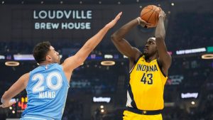 Indiana Pacers forward Pascal Siakam (43) shoots as Cleveland Cavaliers forward Georges Niang (20) defends in the first half of an NBA basketball game, Sunday, Jan. 12, 2025, in Cleveland. (Sue Ogrocki/AP)