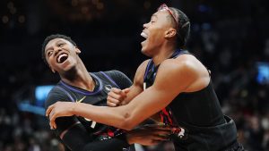 Toronto Raptors' RJ Barrett and Scottie Barnes celebrate after defeating the Minnesota Timberwolves in NBA basketball action in Toronto on Thursday, November 21, 2024. (Frank Gunn/CP)