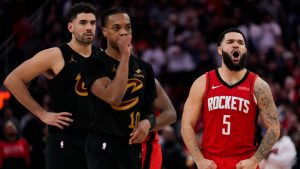 Houston Rockets guard Fred VanVleet (5) celebrates after Cleveland Cavaliers guard Darius Garland (10) misses a penalty shot from a flagrant foul call during the second half of an NBA basketball game in Houston, Wednesday, Jan. 22, 2025. (AP Photo/Ashley Landis)