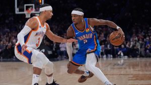 New York Knicks' Josh Hart (3) defends Oklahoma City Thunder's Shai Gilgeous-Alexander (2) during the first half of an NBA basketball game, Friday, Jan. 10, 2025, in New York. (Frank Franklin II/AP)