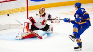 Buffalo Sabres' Jack Quinn (22) scores a goal on Ottawa Senators goalie Anton Forsberg (31) during first period NHL hockey action in Ottawa on Thursday, Jan. 9, 2025. (Sean Kilpatrick/CP)