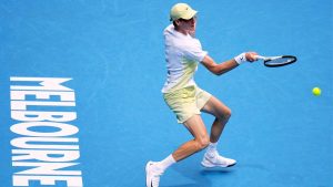 Jannik Sinner of Italy plays a forehand return to Holger Rune of Denmark during their fourth round match at the Australian Open tennis championship in Melbourne, Australia, Monday, Jan. 20, 2025. (Vincent Thian/AP)