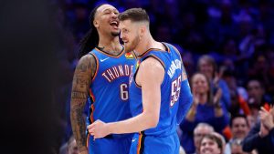 Oklahoma City Thunder center Isaiah Hartenstein (55) and forward Jaylin Williams (6) celebrate after a dunk by Hartenstein during the second half of an NBA basketball game. (Nate Billings/AP)