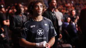 Payton Talbott leaves the Octagon after defeating Yanis Ghemmouri in the first round of their bantamweight fight during the UFC 303 mixed martial arts event Saturday, June 29, 2024, in Las Vegas. (Steve Marcus/Las Vegas Sun via AP)