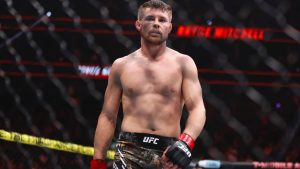 Bryce Mitchell stands in the Octagon after defeating Kron Gracie in a UFC 310 mixed martial arts featherweight bout at T-Mobile Arena, Saturday, Dec. 7, 2024, in Las Vegas. (Wade Vandervort/Las Vegas Sun via AP)