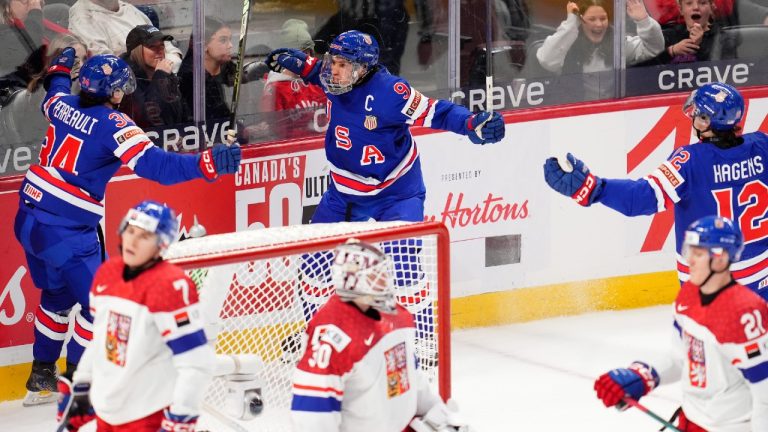 USA forward Ryan Leonard (9) celebrates his goal with teammates Gabe Perreault (34) and James Hagens (12) during third period World Junior hockey championship semifinal action against Czechia, in Ottawa, Saturday, Jan. 4, 2025. (Sean Kilpatrick/CP)