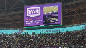 A video assistant referee (VAR) announces a possible penalty during the World Cup group H soccer match between Portugal and Uruguay, at the Lusail Stadium in Lusail, Qatar, Monday, Nov. 28, 2022. (Martin Meissner/AP)