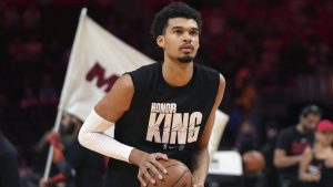 San Antonio Spurs centre Victor Wembanyama wears a t-shirt in honour of Martin Luther King Jr. as he warms up before an NBA basketball game against the Miami Heat, Sunday, Jan. 19, 2025, in Miami. (Lynne Sladky/AP)
