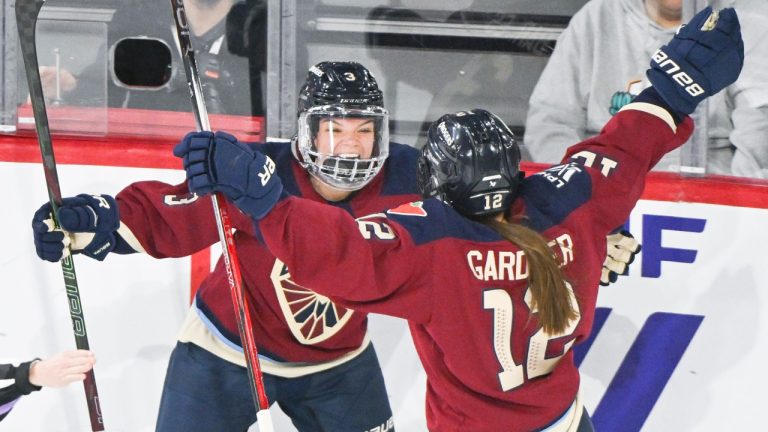 Montreal Victoire's Cayla Barnes (3) celebrates with teammate Jennifer Gardiner (12) after scoring against the New York Sirens during second period PWHL hockey action in Laval, Que., Wednesday, December 4, 2024. THE CANADIAN PRESS/Graham Hughes