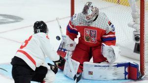 Canada forward Tanner Howe (23) scores on Czechia goaltender Michael Hrabel (30) during first period IIHF World Junior Hockey Championship quarterfinal action in Ottawa, Thursday, Jan. 2, 2025. (Adrian Wyld/CP)