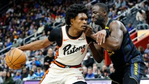 Detroit Pistons forward Ausar Thompson (9) drives against Golden State Warriors forward Draymond Green, right, during the first half of an NBA basketball game Thursday, Jan. 9, 2025, in Detroit. (Duane Burleson/AP)