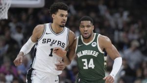 San Antonio Spurs centre Victor Wembanyama (1) and Milwaukee Bucks forward Giannis Antetokounmpo (34) jockey for position during the second half of an NBA basketball game in San Antonio, Friday, Jan. 31, 2025. (Eric Gay/AP)
