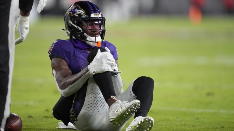 Baltimore Ravens wide receiver Zay Flowers pauses after being injured during the first half of an NFL football game against the Cleveland Browns. (Stephanie Scarbrough/AP)