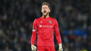 Real Sociedad's goalkeeper Alex Remiro celebrates as Mikel Oyarzabal scores the opening goal during the Europa League opening phase soccer match between Real Sociedad and Dynamo Kyiv at the Reala Arena stadium in San Sebastian, Spain, Thursday, Dec. 12, 2024. (Miguel Oses/AP)