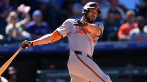 Baltimore Orioles' Anthony Santander singles off Colorado Rockies relief pitcher Justin Lawrence in the ninth inning of after a baseball game Sunday, Sept. 1, 2024, in Denver. (David Zalubowski/AP)