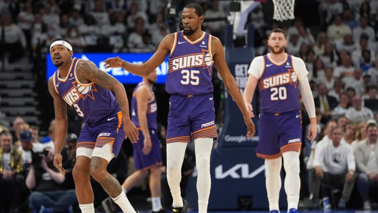 Phoenix Suns guard Bradley Beal (3), forward Kevin Durant (35) and center Jusuf Nurkic (20) walk across the court during the first half of Game 2 of an NBA basketball first-round playoff series against the Minnesota Timberwolves, Tuesday, April 23, 2024, in Minneapolis. (Abbie Parr/AP)