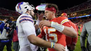 Buffalo Bills quarterback Josh Allen, left, and Kansas City Chiefs quarterback Patrick Mahomes (15) shake hands following an NFL football game Sunday, Dec. 10, 2023, in Kansas City, Mo. The Bills won 20-17 (Ed Zurga/AP Photo)