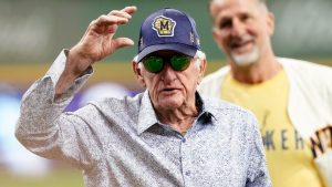 Milwaukee Brewers radio announcer Bob Uecker gestures to the crowd before a baseball game between the Milwaukee Brewers and the Miami Marlins Sunday, July 28, 2024, in Milwaukee. (Aaron Gash/AP)