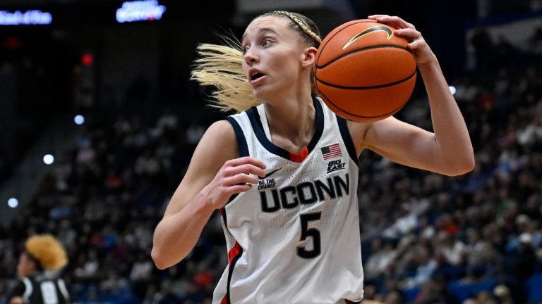 UConn guard Paige Bueckers (5) in the first half of an NCAA college basketball game. (Jessica Hill/AP)